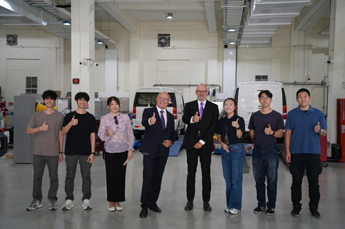 A memorable group photo with the President and Vice President from RWU.(Open new window/jpg file)Image