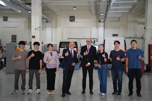 A memorable group photo with the President and Vice President from RWU.(Open new window/jpg file)Image